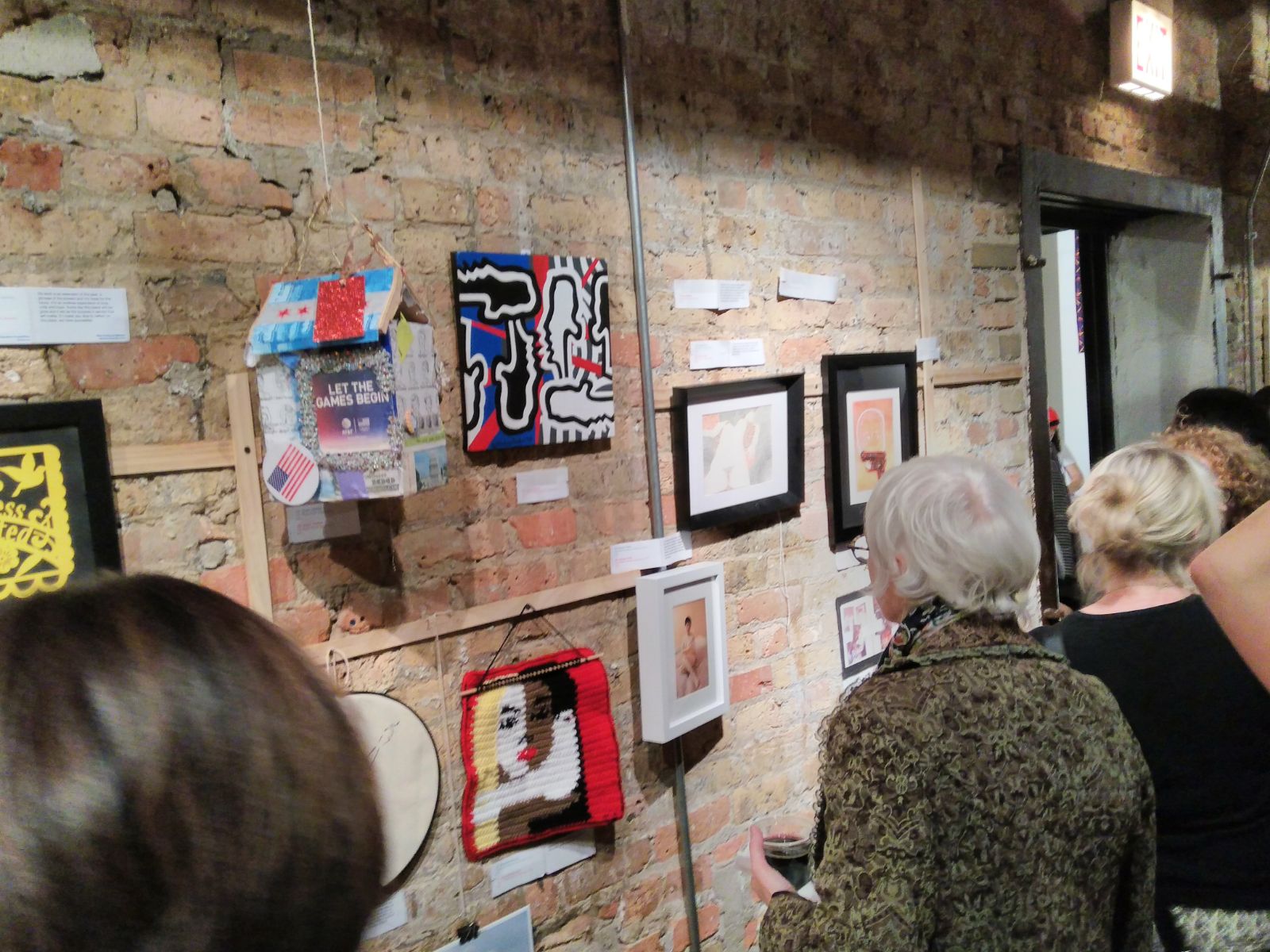 Audience deep in contemplation and admiration looking at my art piece at Chicago Exhibition in 2017